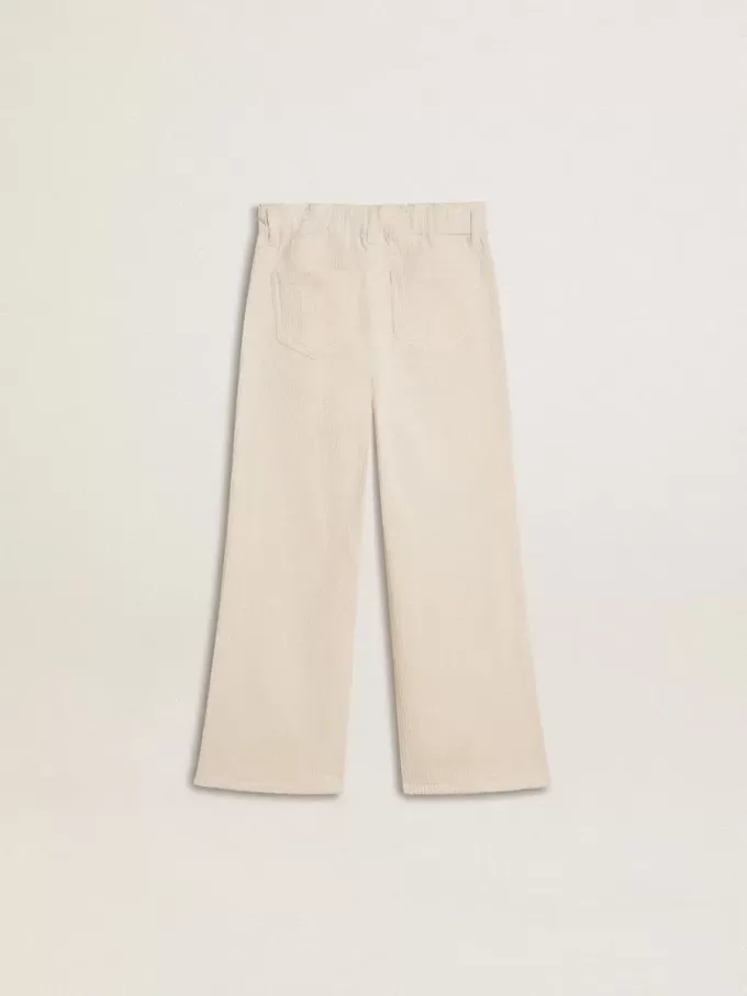 Pantalones anchos de canalé color crema con bordados para niña