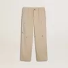 Pantalones chinos beige para niño con salpicaduras multicolores