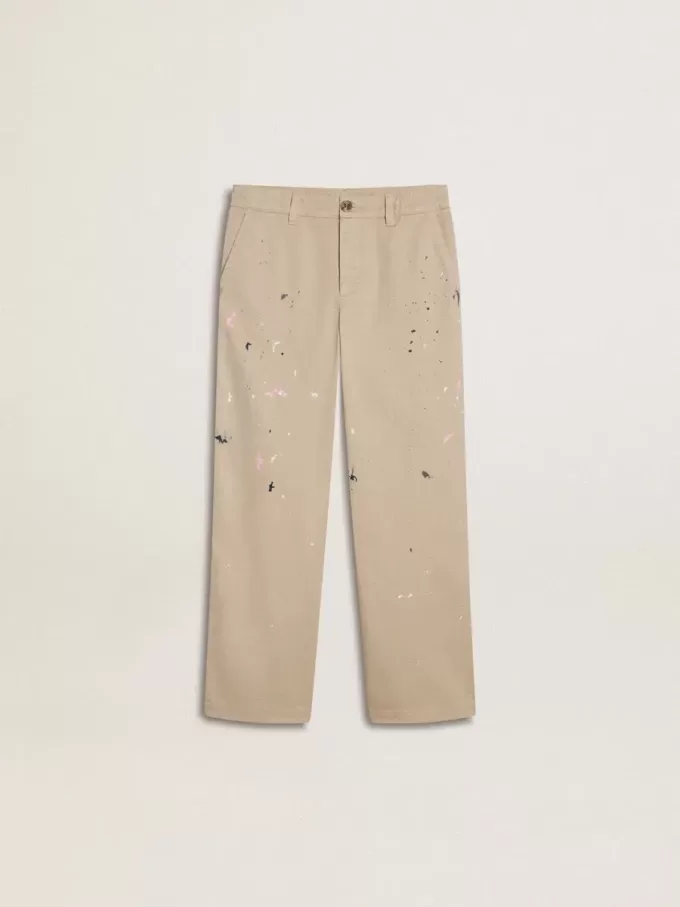Pantalones chinos beige para niño con salpicaduras multicolores