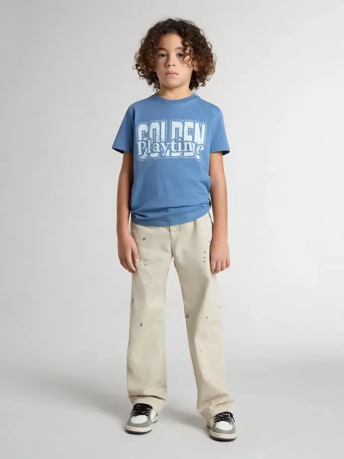 Pantalones chinos beige para niño con salpicaduras multicolores