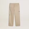 Pantalones chinos beige para niño con salpicaduras multicolores