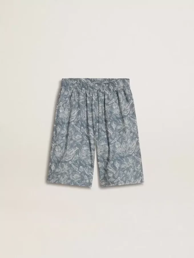 Pantalones cortos azules para niño con estampado blanco Pantalones cortos azules para niño con estampado blanco