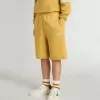 Pantalones cortos de jogging para niños en amarillo ocre con bordado