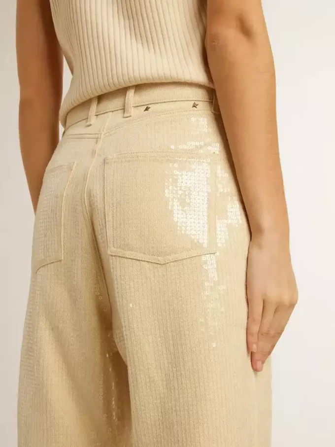 Pantalones crudo con lentejuelas transparentes por toda la prenda