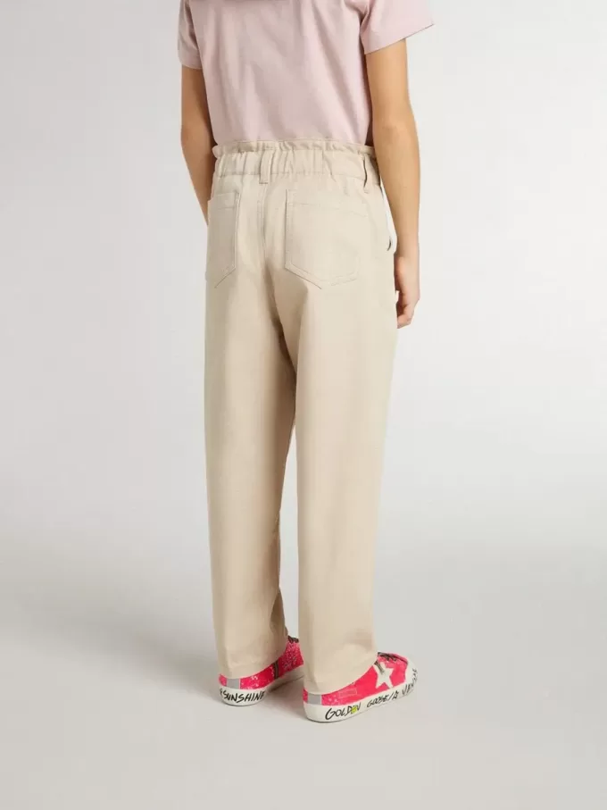 Pantalones de algodón beige con bordado para niña
