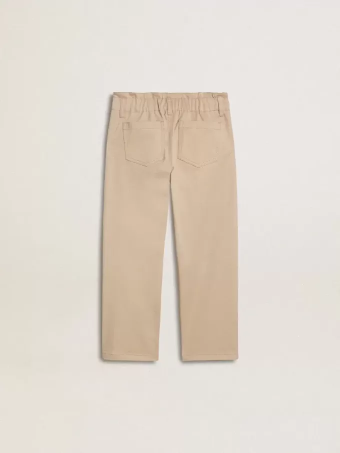 Pantalones de algodón beige con bordado para niña