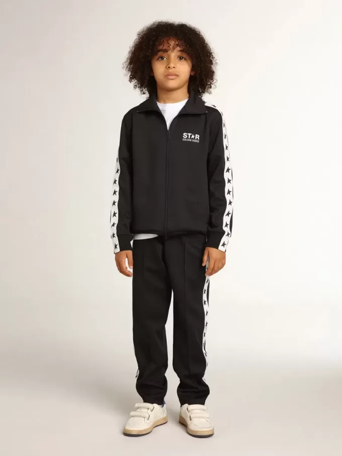 Pantalones de chándal azul oscuro con franja blanca y estrellas en contraste Pantalones de chándal azul oscuro con franja blanca y estrellas en contraste