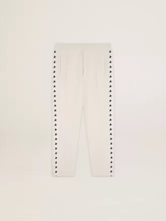 Pantalones de chándal blancos para hombre con estrellas negras en los laterales