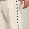 Pantalones de chándal blancos para hombre con estrellas negras en los laterales