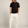 Pantalones de chándal blancos para hombre con estrellas negras en los laterales