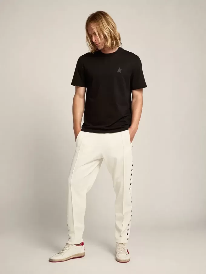 Pantalones de chándal blancos para hombre con estrellas negras en los laterales