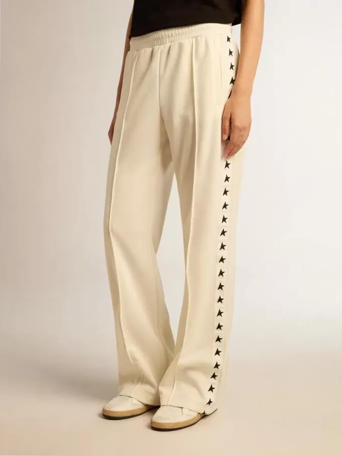 Pantalones de chándal blancos para mujer con estrellas en los laterales