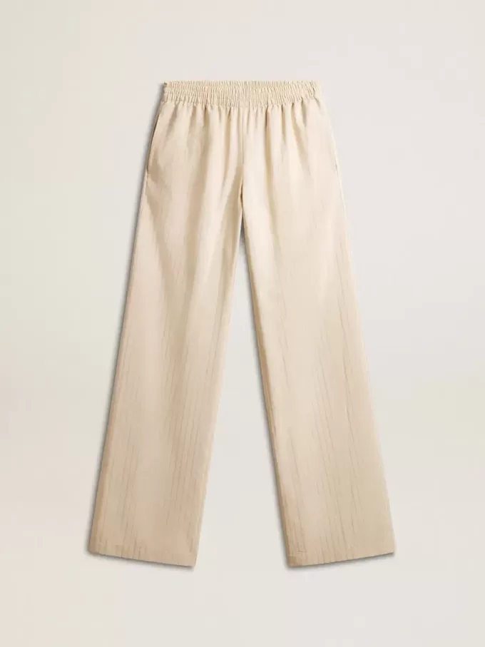 Pantalones de chándal de seda y viscosa beige claro para mujer. Pantalones de chándal de seda y viscosa beige claro para mujer.