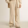 Pantalones de chándal de seda y viscosa beige claro para mujer. Pantalones de chándal de seda y viscosa beige claro para mujer.