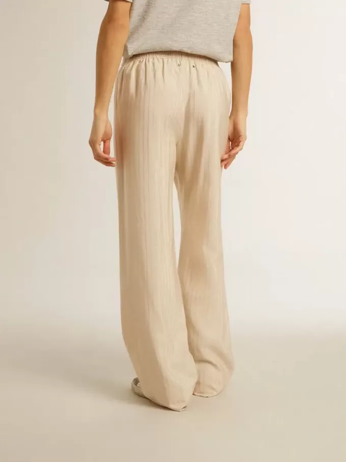 Pantalones de chándal de seda y viscosa beige claro para mujer. Pantalones de chándal de seda y viscosa beige claro para mujer.