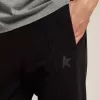 Pantalones de chándal negros para hombre con estrella en la parte delantera