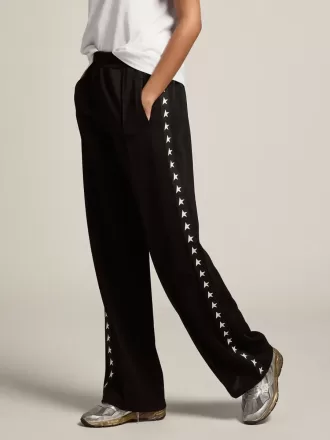 Pantalones de chándal negros para mujer con estrellas blancas en los laterales