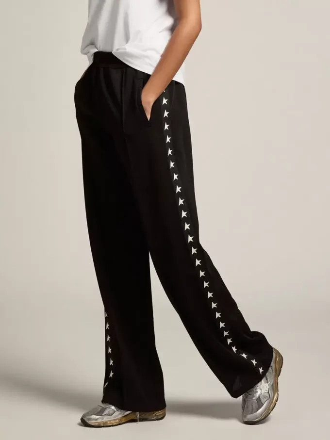 Pantalones de chándal negros para mujer con estrellas blancas en los laterales
