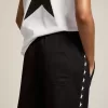Pantalones de chándal negros para mujer con estrellas blancas en los laterales