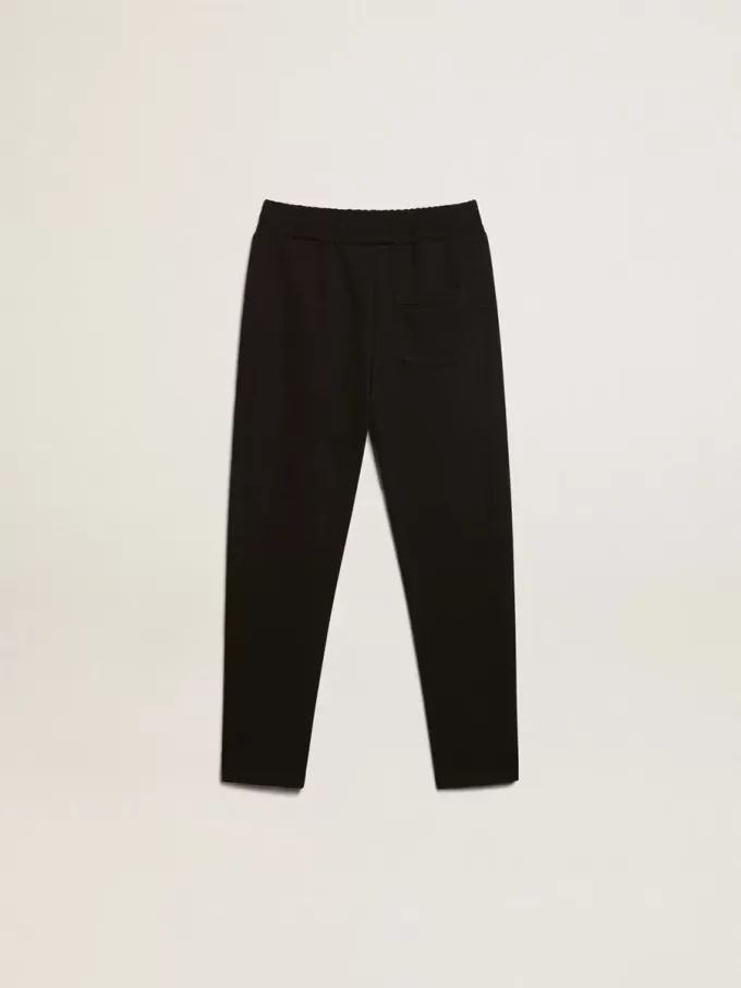 Pantalones de chándal negros para niño con estrellas blancas