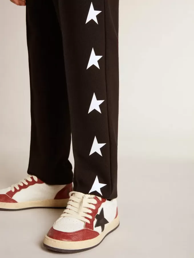 Pantalones de chándal negros para niño con estrellas blancas