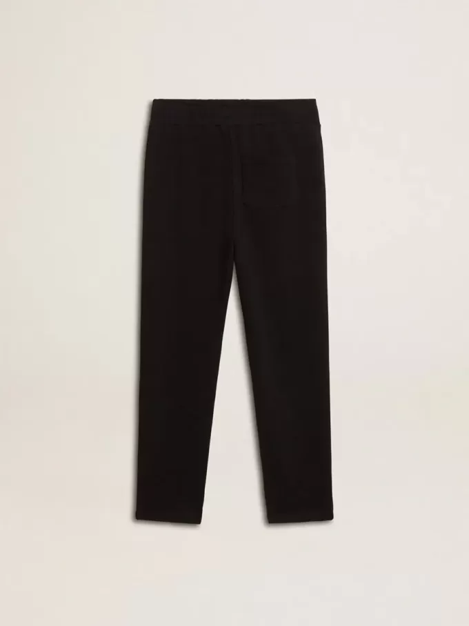 Pantalones de chándal negros para niño con estrellas blancas