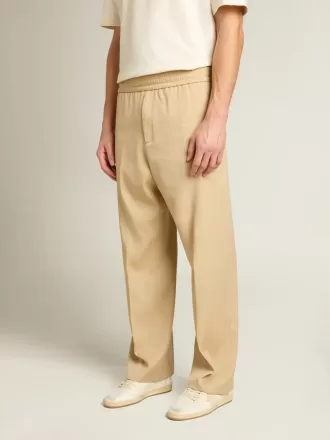 Pantalones de chándal para hombre color arena con bolsillo trasero