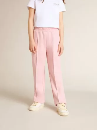 Pantalones de chándal rosas con estrella brillante en la parte delantera.
