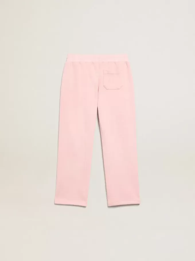 Pantalones de chándal rosas con estrella brillante en la parte delantera.