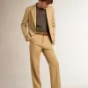 Pantalones de gabardina de lana para hombre en color arena