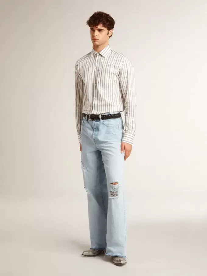 Pantalones de hombre en denim con efecto desgastado Pantalones de hombre en denim con efecto desgastado