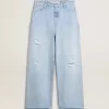 Pantalones de mujer en denim con efecto desgastado