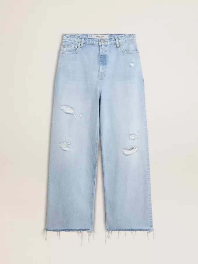 Pantalones de mujer en denim con efecto desgastado