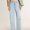 Pantalones de mujer en denim con efecto desgastado
