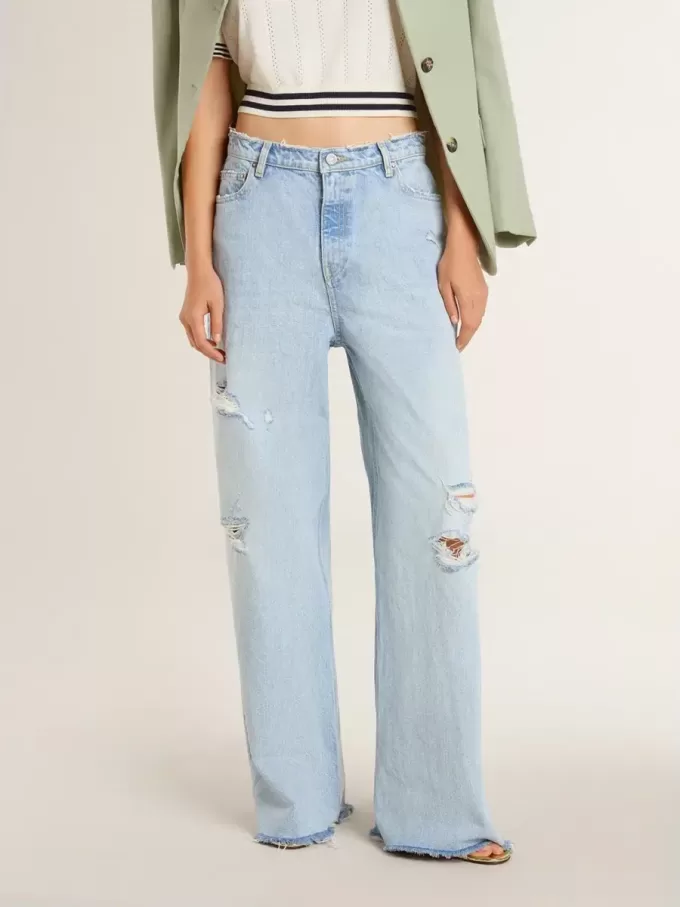 Pantalones de mujer en denim con efecto desgastado