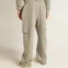 Pantalones joggers cargo de algodón gris jaspeado con bordados.