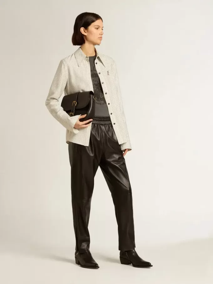 Pantalones joggers negros de piel napa con cremallera en la base