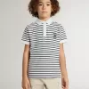 Polo blanco de algodón para niño con rayas azul marino y bordado Polo blanco de algodón para niño con rayas azul marino y bordado