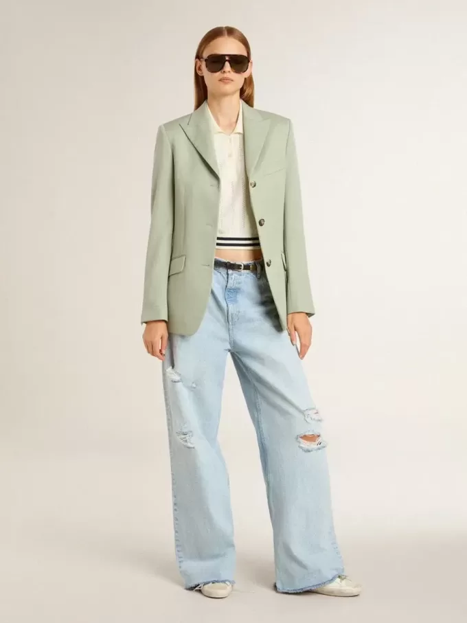 Polo corto de algodón blanco desgastado para mujer con ribetes azules