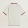 Polo de hombre en punto perforado blanco con detalles de rayas burdeos Polo de hombre en punto perforado blanco con detalles de rayas burdeos