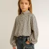Polo para niña con estampado geométrico