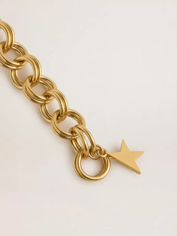 Pulsera de cadena tejida en color oro antiguo con cierre en forma de estrella