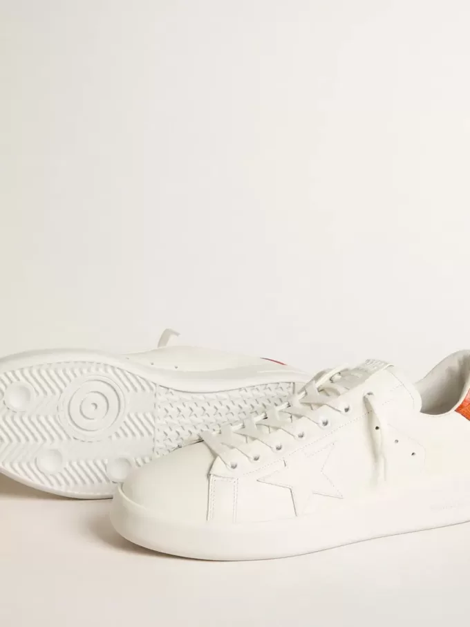 Purestar para hombre con estrella de cuero blanco y lengüeta naranja en el talón