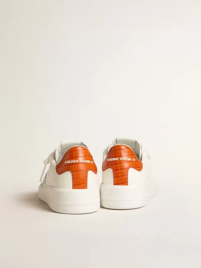 Purestar para hombre con estrella de cuero blanco y lengüeta naranja en el talón