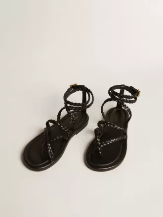 Sandalias planas Penelope para mujer en piel negra.