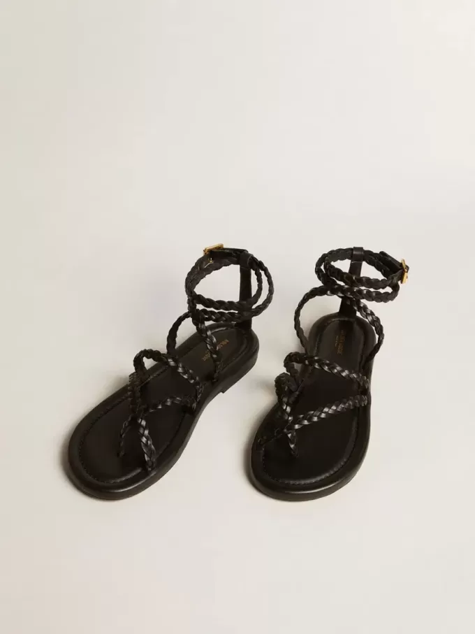 Sandalias planas Penelope para mujer en piel negra.