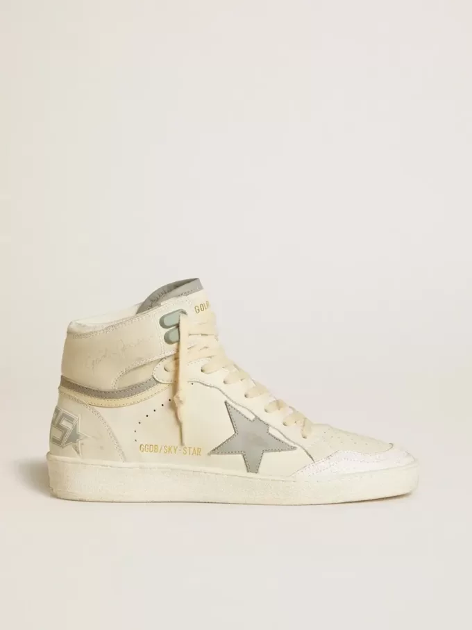 Sky-Star para mujer en piel con estrella de piel azul claro y lengüeta blanca en el talón.