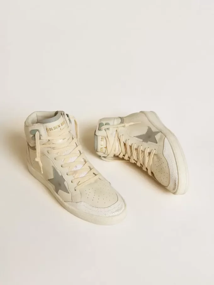 Sky-Star para mujer en piel con estrella de piel azul claro y lengüeta blanca en el talón.