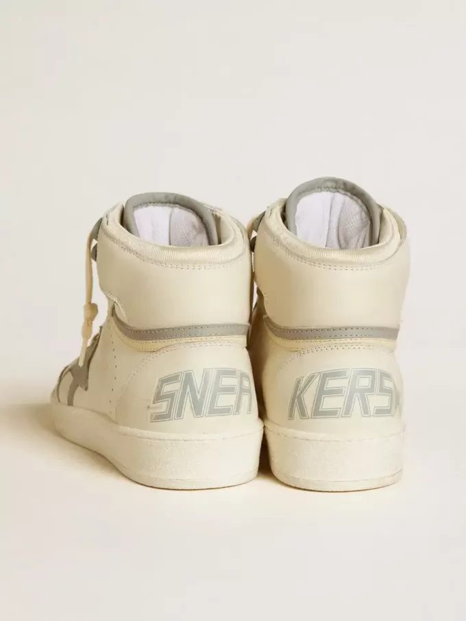 Sky-Star para mujer en piel con estrella de piel azul claro y lengüeta blanca en el talón.