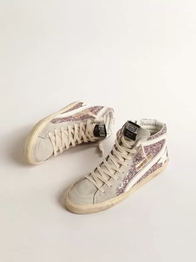 Slide en lila brillante con estrella y destello de cuero blanco